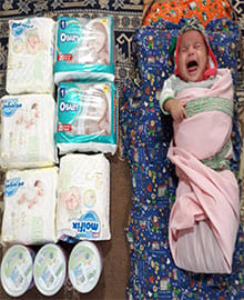 تهیه شیرخشک و پوشک برای نوزادان نیازمند روستای اومار شهرستان نیمروز